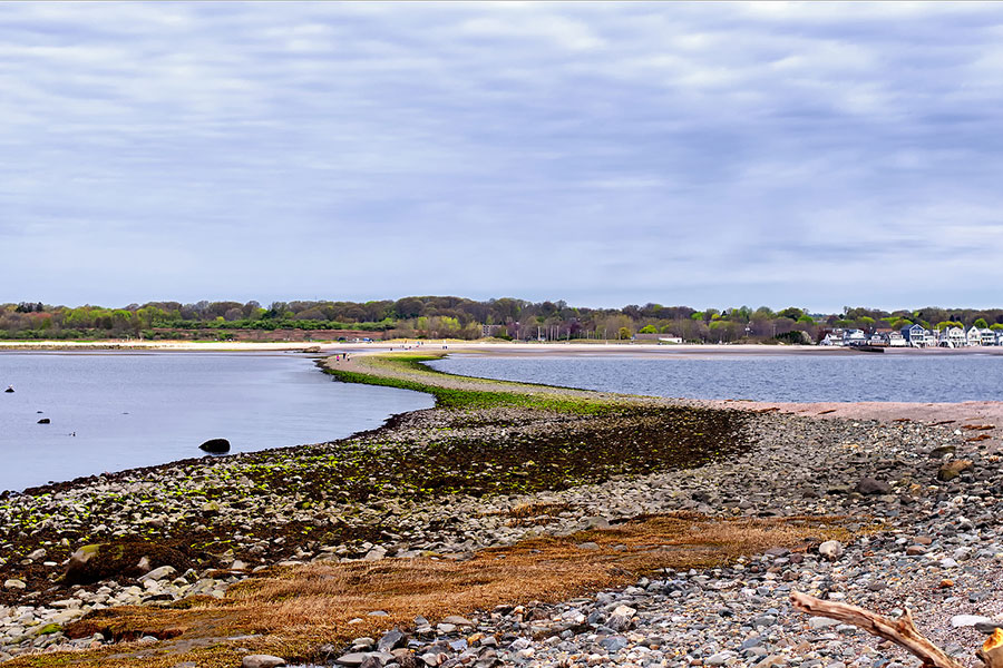 sand bar connecting charles island at lowtide in long island sound to Silver Sands State Park